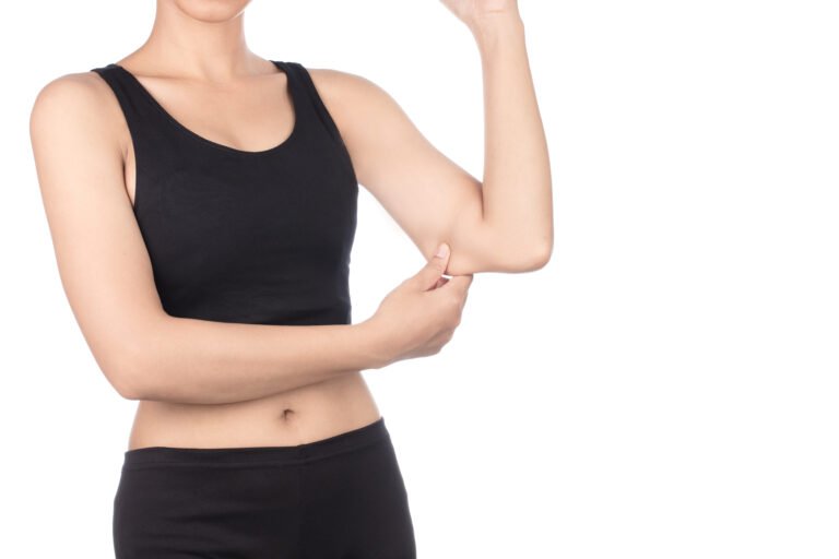 female fitness model posing isolated on white background
